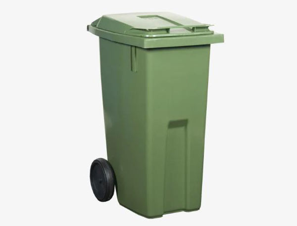 Ett grönt sopkärl